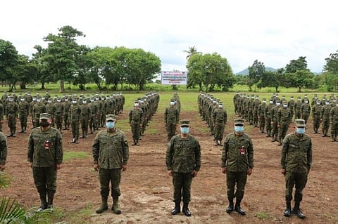 ZAMBOANGA. Two hundred twenty-seven new soldiers take oath Thursday, July 30, as new members of the Armed Forces of the Philippines (AFP). A photo handout shows the new soldiers and their training staff stand in formation at the 6th Division Training School in Semba village, Datu Odin Sinsuat, Maguindanao. (SunStar Zamboanga)
