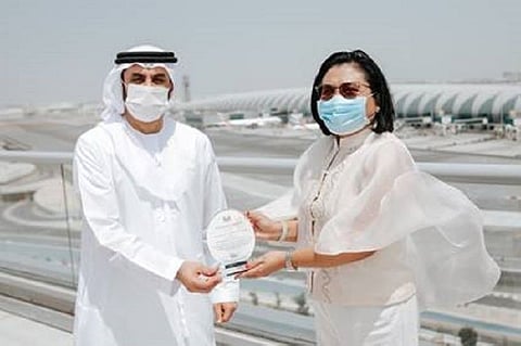 TOKEN OF APPRECIATION. Her Excellency Hjayceelyn M. Quintana, Ambassador of the Republic of the Philippines, presenting a token of appreciation to Adnan Kazim, Chief Commercial Officer, Emirates, for the airline's efforts in repatriating 27,000 citizens of the Philippines to their homes. (Contributed photo)