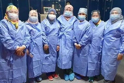 PINOY FRONTLINERS IN LIBYA. Filipino frontliners in Libya get face shields from Pampanga Vice Governor Lilia Pineda and Converge ICT Chief Executive Officer Dennis Uy. (Contributed photo)