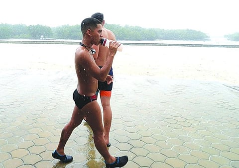 'Little Merman' takes 17½ hours to swim around Mactan Island. (Photo by Alan Tangcawan)