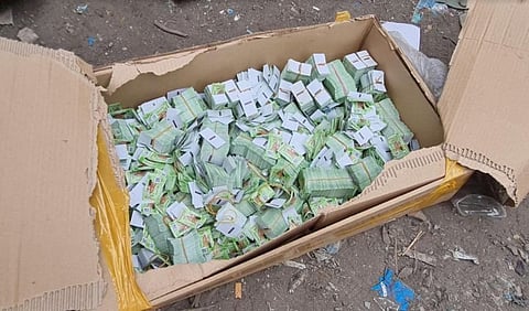 BACOLOD. A team from the Bureau of Internal Revenue-Region 12 led by Director Antonio Jonathan Jaminola, along with personnel of the National Bureau of Investigation and Philippine Army, seize over half a billion worth of fake tax stamps and cigarettes in a raid at a storage facility in Barangay Tangub, Bacolod City Tuesday, May 4, 2021. (Erwin Nicavera)