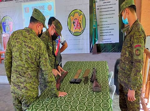 ZAMBOANGA. Two more members of the New People' Army (NPA) surrender Thursday, November 11, in Central Mindanao as the Joint Task Force (JTF)-Central stepped up its combat and non-combat operations. A photo handout shows military officials inspect the firearms the two NPA surrenderers have turned over to them. (SunStar Zamboanga)