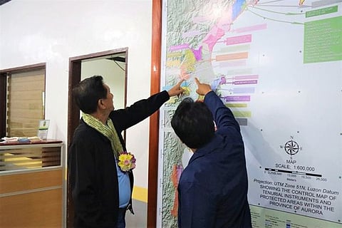 PROTECT SIERRA MADRE. Environment Secretary Roy Cimatu looks at a map showing the 1.6 million hectare Sierra Madre Mountain Range during his visit in Aurora province recently. (DENR)