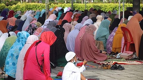 FEAST OF SACRIFICE. Muslims gather at the Plaza Independencia in downtown Cebu City early Saturday morning, July 9, 2022, to hold morning prayers in observance of Eid'l Adha. Eid'l Adha, the second and bigger of the two main holidays celebrated in Islam, honors the willingness of Ibrahim to sacrifice his son Ishmail as an act of obedience to Allah. (Photo by Cebu City Public Information Office)