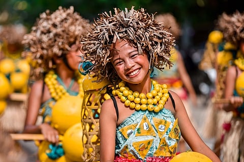 A smile sweeter than the sweetest lanzones. A Kalanrakas sa Kabataan participant (Photo by JC Molina)