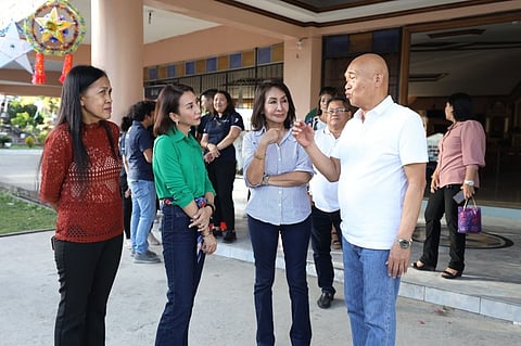 MOALBOAL Mayor Inocentes “Titing” Cabaron (rightmost) talks to Gov. Gwen Garcia, Tourism Secretary Christina Garcia-Frasco and Moalboal Vice Mayor Paz Rozgoni after the groundbreaking of the town’s Tourist Rest Area last December. Cabaron has credited Garcia’s policies for improving the southwestern town’s tourist arrivals last year. / Moalboal Public Information Office