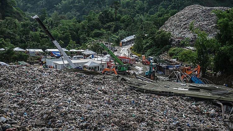 Trucks continue hauling days after deadly Cebu landslide