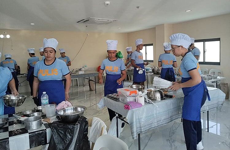 Mandaue police swap handcuffs for baking tools in livelihood training