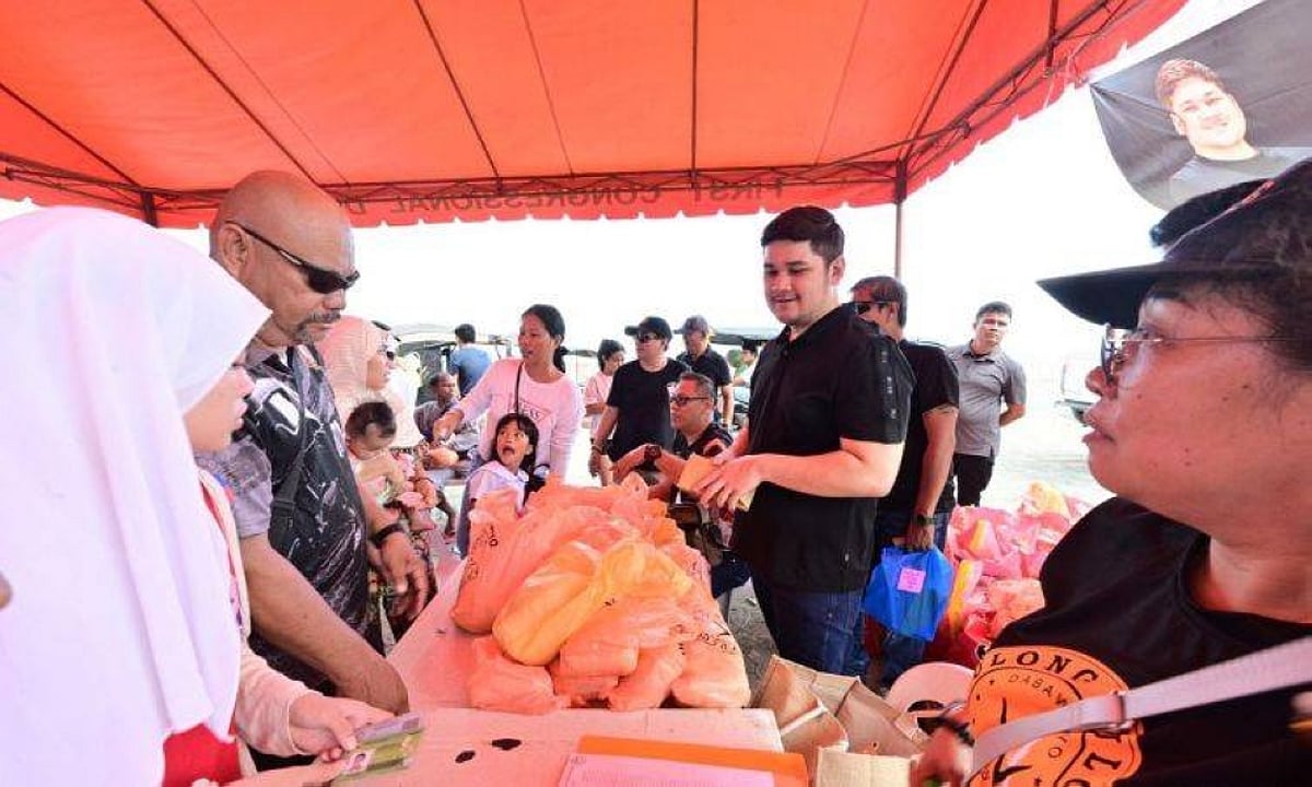 Rep. Duterte distributes rice, cash aid to over aid to over 2K fisherfolks