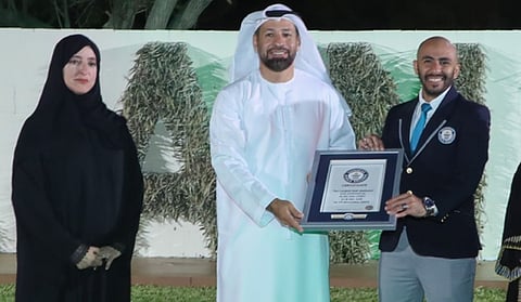 Al Ain Zoo Sets Guinness World Record with Largest Sentence Made of Palm Leaves