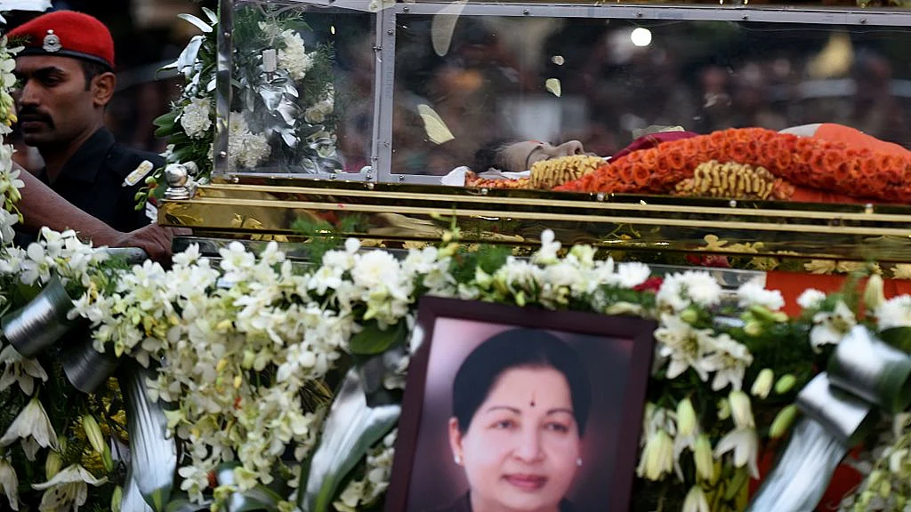 

The mortal remains of Jayalalithaa are carried during a procession to her burial place in Chennai. (ARUN SANKAR/AFP/GettyImages)