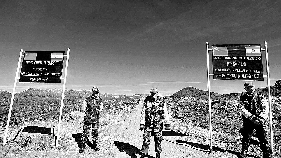Indian army soldiers stand guard at the Indo-China border in Arunachal Pradesh