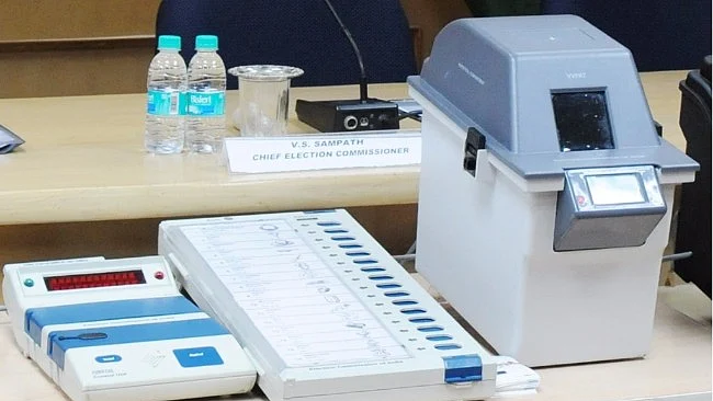 Image of a Voter Verifiable Paper Audit Trail (VVPAT) machine with an EVM, or electronic voting machine. (Photo Via PIB)