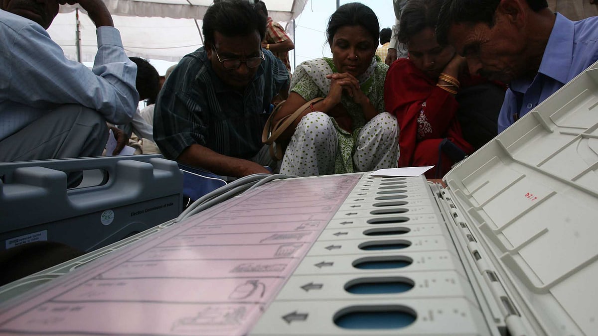 ECI Officials checking EVMs before deploying them (Vikas Khot./Hindustan Times via Getty Images)