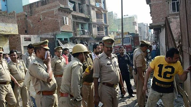 Policemen raid at a slaughterhouse in Moradabad. (PTI)