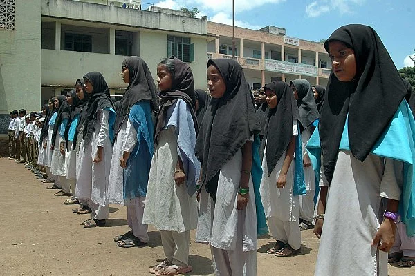 Students line up at a school assembly. (Pic: GettyImages/Hindustan Times)