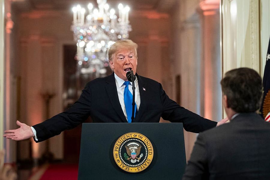 US President Donald Trump gets into an exchange with CNN reporter Jim Acosta during a news conference at the White House in Washington. (Al Drago - Pool/GettyImages) 