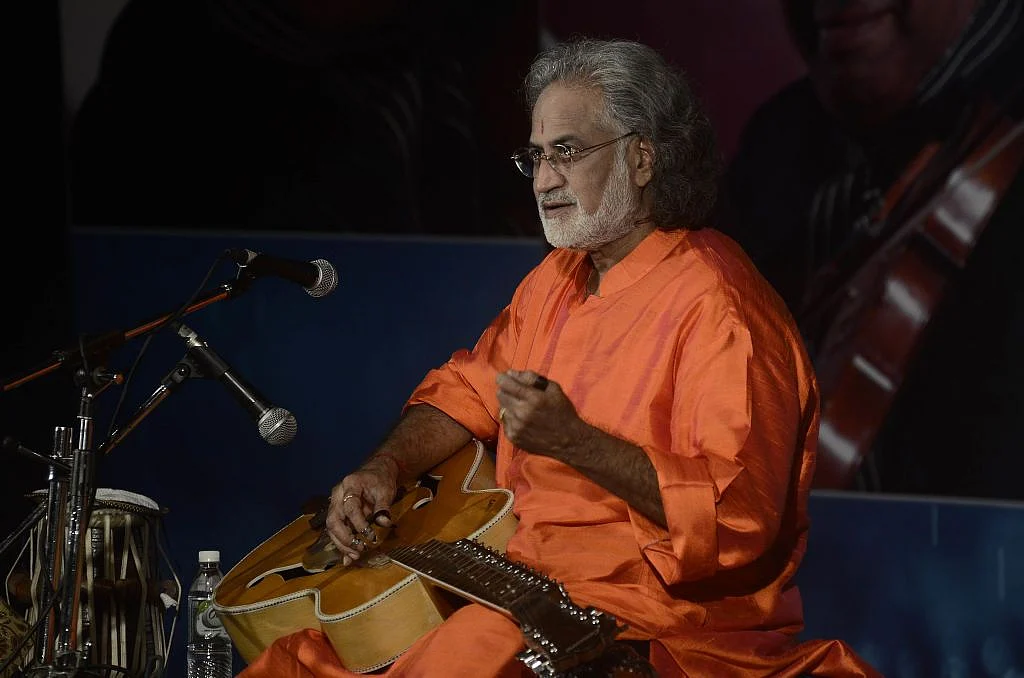 Pandit Vishwa Mohan Bhat plays Mohan veena at an event in Pune. (Ravindra Joshi/Hindustan Times via Getty Images)&nbsp;