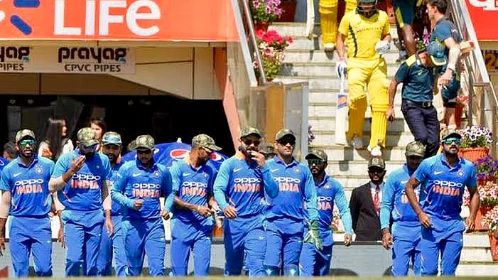 Indian cricket team wearing military camouflage caps during an ODI against Australia (Pic: twitter)