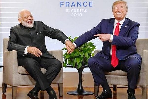 Prime Minister Modi - left, US President Trump - right
