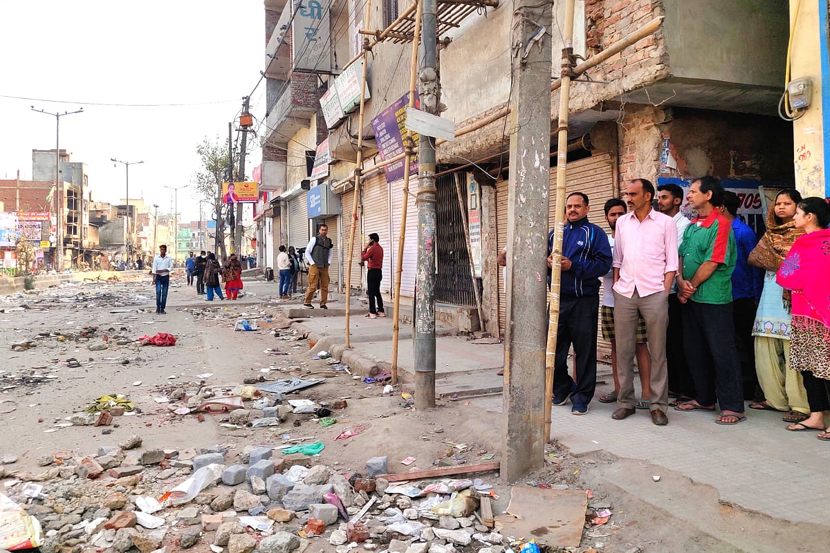 Residents of the lane in which Ankit Sharma’s house is located. The picture was clicked on 27 February/Swarajya
