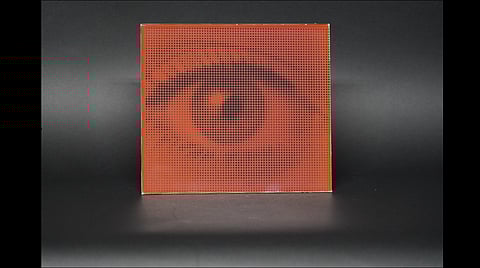 Patterned film layers applied to PV modules to achieve customized designs, allowing them to blend with building materials like tiles or brick surfaces. 