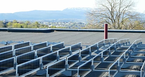 Over Easy Solar's pre-assembled vertical PV system for flat and green roofs on display at Intersolar Europe 2026. (Image Credit: Over Easy Solar)