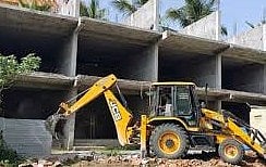 dmk municipal chairman encroched government land 