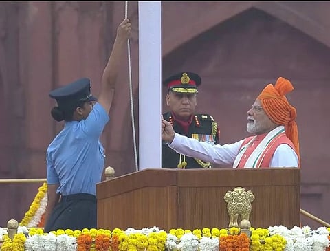 Prime Minister Narendra Modi hoisted the national flag at the Red Fort in Delhi and received the guard of honour