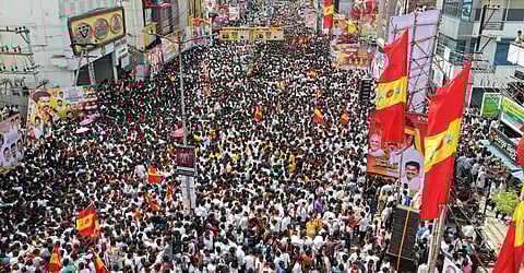 TVK Public Meeting Schedule Date at Vellore crowd gathered with water bottles and a tent set up for Vijay Meeting
