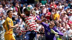 United States advanced to the knockout stage of the World Cup football tournament by defeating Australia