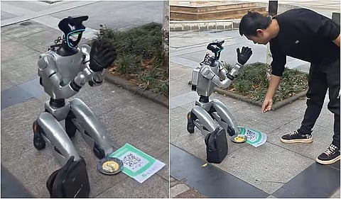 வ"No money to pay the electricity bill? A robot in China begging with a QR code card goes viral on social media."
