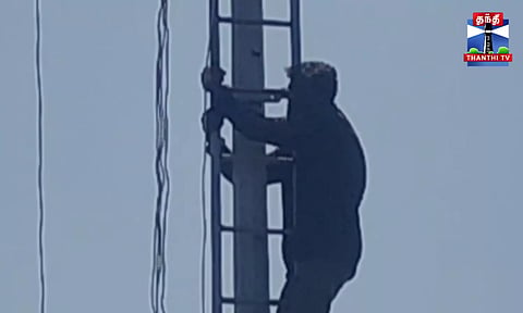 போதையில் டவரில் ஏறி தற்கொலை மிரட்டல் விடுத்த நபர்