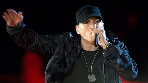 Eminem shared that he and his friends would take turns buying tapes.
