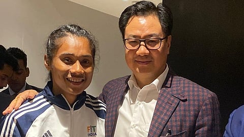Hima Das with Minister of Youth Affairs and Sports Kiren Rijiiju