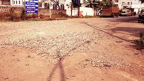Loose gravel spread on Chakan MIDC roads