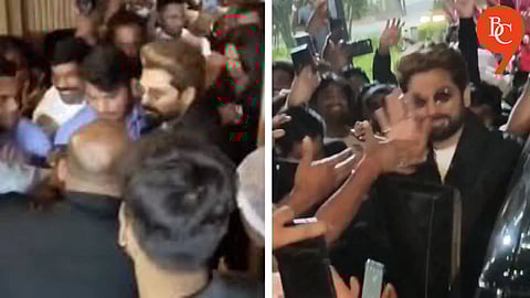 Viral Video: Allu Arjun Shields Sneha Reddy from Crowd at Hyderabad Cafe