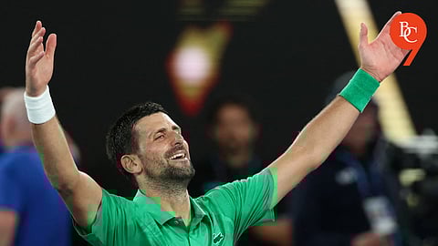 38 years young: Novak Djokovic gasps and vomits amidst a five-set epic to reach 38th grand slam final