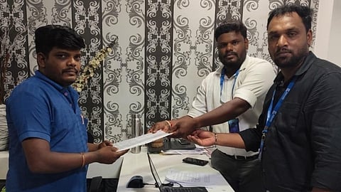 G Square representatives present the documents for Tamil Nadu’s first-ever presenceless property registration to Mr. Balamurugan.