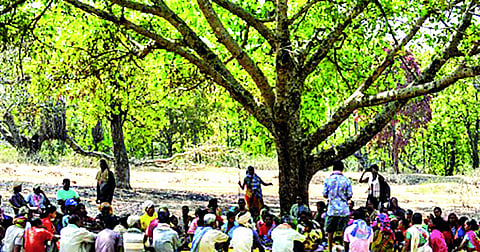 Image represents the essence of an empowered Gram Sabha in a picturesque countryside setting.