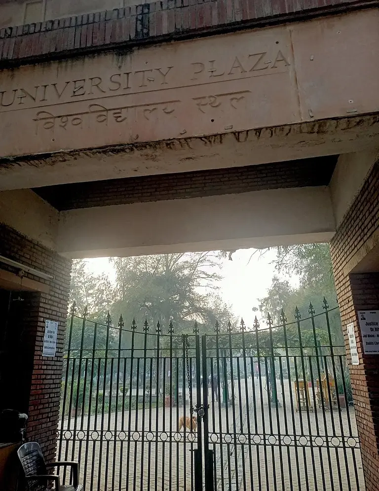 The university gates have been allegedly locked to prevent Dr Ritu SIngh's entry inside the campus.
