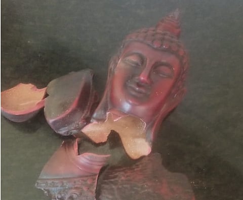 The complainant alleged that the accused destroyed his Gautam Buddha statue. 