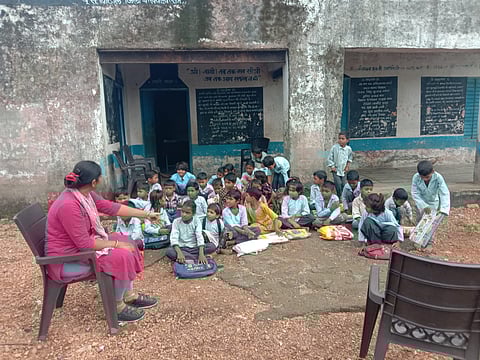 Classrooms stand as crumbling ruins, kitchen sheds are coated in thick soot, and broken boundary walls offer no security, forcing students to learn under the open sky. 