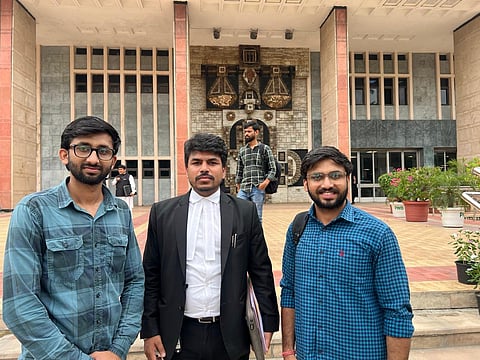 Advocate Sushant Singh (c) with the petitioners Vishal and Manish. 