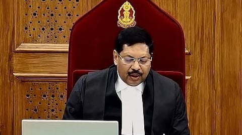 Advocate Rakesh Kishore took out his sports shoes and threw them at CJI Gavai during the proceedings in Court No 1. 