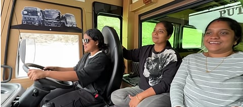 Devika (left), flanked by her trailblazing mother Jalaja and aunt Surya, grips the wheel of their family caravan with unyielding confidence—three Kerala women redefining the road as a realm of empowerment, one kilometer at a time.