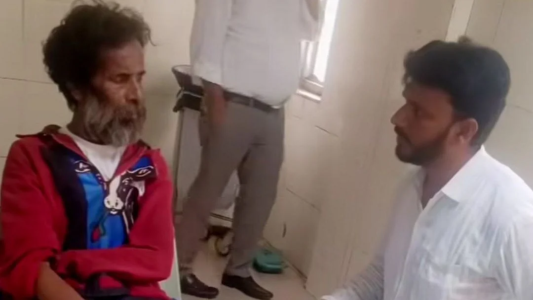 Social worker Barkat Ali with Dr. Rashid