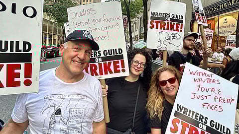 Hollywood writers call off five-month strike after tentative agreement with studios 