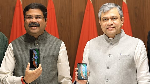 Union Ministers Dharmendra Pradhan and Ashwini Vaishnaw with  BharOS phones