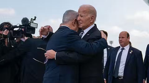 U.S. President Joe Biden is greeted by Israeli Prime Minister Benjamin Netanyahu after arriving in Tel Aviv on Oct. 18. 